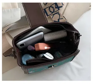Top view of bucket bag interior showing multiple compartments and spacious storage capacity