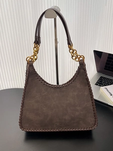 Retro dark brown suede half-moon shoulder bag with chic gold chain strap detail