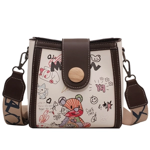 Fashionable beige graffiti crossbody bucket bag with bear print and wide shoulder strap