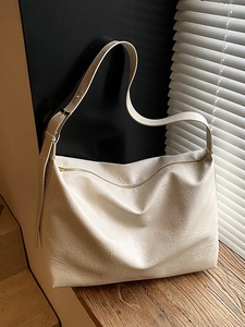 Cream white large capacity tote bag with soft texture and golden hardware details