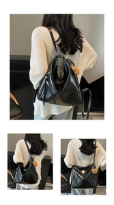 Detail of glossy black PU leather tote bag featuring a teddy bear charm and metal logo
