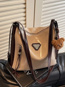 Retro contrast color oil wax leather tote bag with a cute plush bear pendant accessory