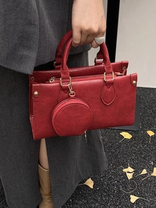 Fashionable red leather handbag set with round coin purse and metal rivets decoration