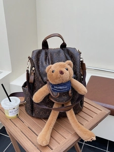 Cute dark brown PU leather backpack with bear prints and a plush bear doll attachment