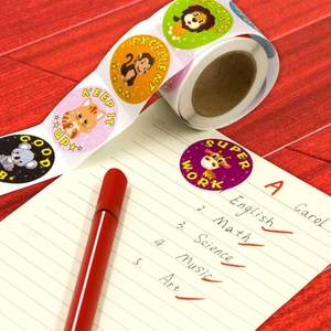 Roll of reward stickers for children featuring cartoon animals and motivational English text