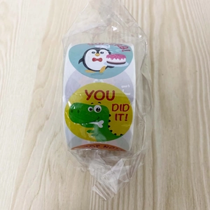 Detail of cartoon reward stickers on roll with Superb and You Did It slogans for kids