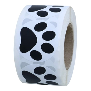 Self-adhesive pet paw print stickers on a roll for children wall decor and DIY crafts