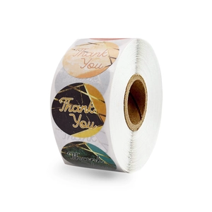 Roll of marble and gold geometric round thank you stickers for gift packaging sealing