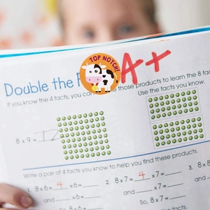 500pcs reward stickers for children on a math workbook with TOP NOTCH and A+ labels