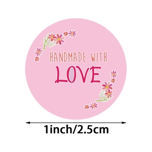 Pink circular stickers with flower patterns and Handmade with Love text in 1 inch size