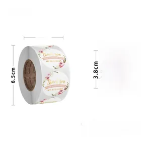 Close-up of 3.8cm round floral Thank You adhesive labels roll for craft sealing