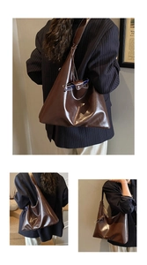 Detail view of large dark brown glossy tote bag with minimalist shoulder strap style