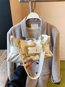 White ruched leather underarm bag featuring a gold chain and large square buckle