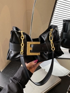 Fashionable black pleated leather underarm bag with gold metal buckle and chain strap
