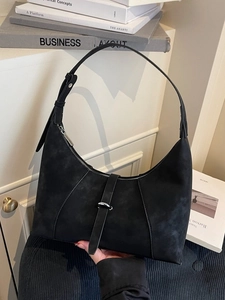 Retro black crescent shoulder bag in matte faux suede with buckle detail for women