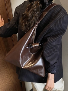 Brown glossy leather tote bag for women with large capacity and stylish wide strap
