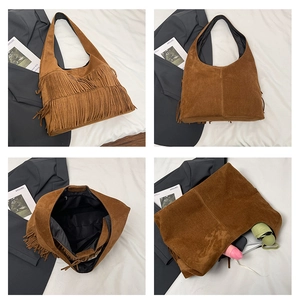 Detail of brown suede fringe tote bag showing spacious interior and bohemian tassels