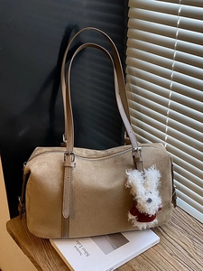 Khaki faux suede tote bag with plush bunny charm and adjustable strap for women