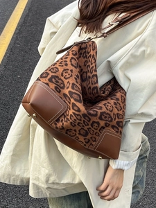 Leopard print faux suede tote bag with brown leather trim and contrast stitching
