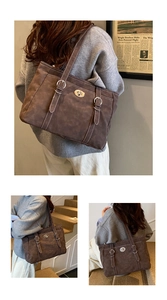 Détail du cabas en faux daim marron foncé avec surpiqûres blanches et fermoir rotatif argent