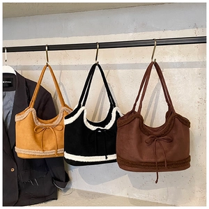 Detailed comparison of three suede tote bags featuring plush faux fur trim and bow accents
