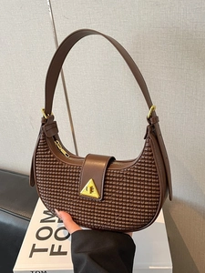 Retro brown woven half-moon underarm bag with golden triangle clasp for autumn
