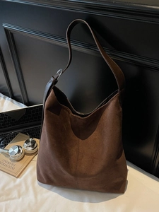 Retro coffee suede hobo bag with large capacity for women in minimalist setting