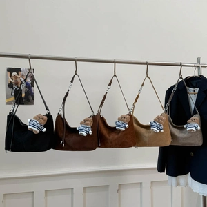 Minimalist hobo bags in five colors with metal chain straps and plush bear charms