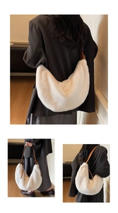 Detail of white faux fur dumpling bag with brown leather handles on a model