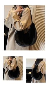 Close-up of black faux fur hobo bag showing soft plush texture and crescent shape