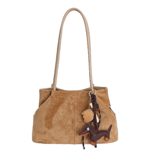 Brown suede tote bag with leather straps and cute dachshund puppy pendant detail