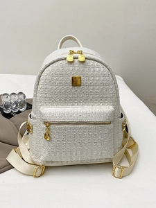 Elegant white tweed backpack for women with gold logo hardware and adjustable straps