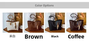 Detail view of four color options for the textured PU leather tote bag with beaded tassels
