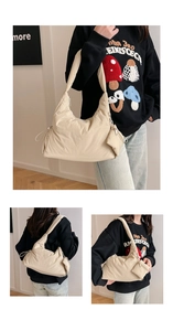 Quilted off-white puffy shoulder bag featuring a drawstring side and matching coin purse