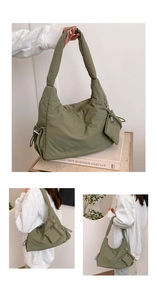 Detail of green quilted tote bag showing padded texture and detachable mini coin purse