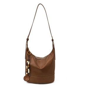 Brown soft leather hobo bucket bag with vintage wooden bead tassel and zip closure