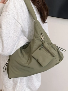 Olive green quilted nylon hobo bag with a matching small coin purse for women