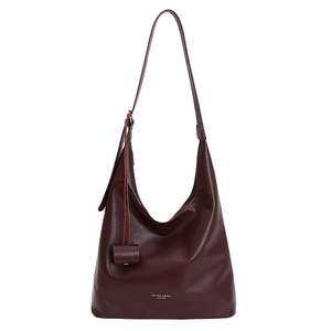 Minimalist burgundy leather tote bag with large capacity and smooth pebbled texture