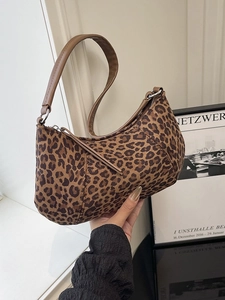 Retro leopard print hobo bag with brown shoulder strap and stylish half-moon shape