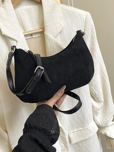 Classic black frosted suede crescent shoulder bag with adjustable silver metal buckle
