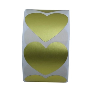 Roll of heart shaped gold adhesive stickers for bakery packaging and gift sealing