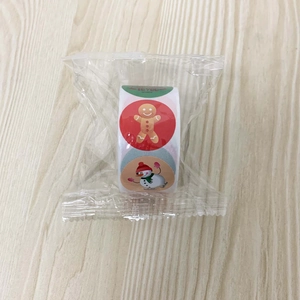 Detail of Christmas roll stickers with cartoon gingerbread man and snowman patterns