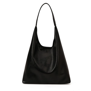 Large black hobo tote bag in soft faux leather with spacious interior for daily commute