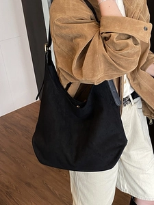 Minimalist black faux suede large hobo shoulder bag with adjustable leather strap