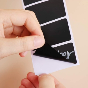 Self-adhesive black chalkboard labels for kitchen jars with easy peel-off design