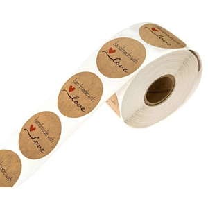 Roll of kraft paper stickers featuring handmade with love text and a red heart icon