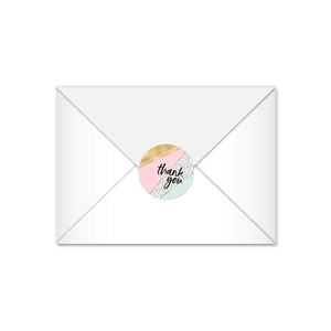 Minimalist round thank you sticker with colorful geometric patterns on white envelope