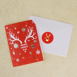Red Christmas card set with white reindeer antlers, envelope and elk seal sticker