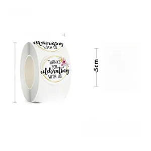 Detail view of floral thank you sticker roll with 2.5cm diameter measurement