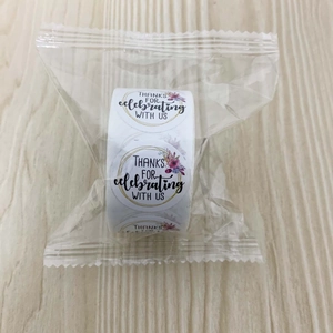 Detail of floral Thank You stickers roll for gift sealing with pink flower design